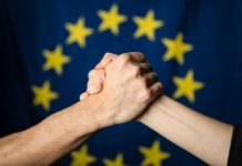 Handshake in front of the European flag Photographer: Mauro Bottaro Copyright: European Union, 2019 Source: EC - Audiovisual Service