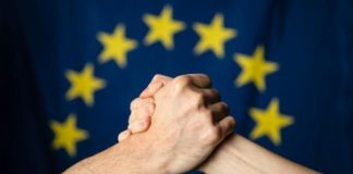 Handshake in front of the European flag Photographer: Mauro Bottaro Copyright: European Union, 2019 Source: EC - Audiovisual Service